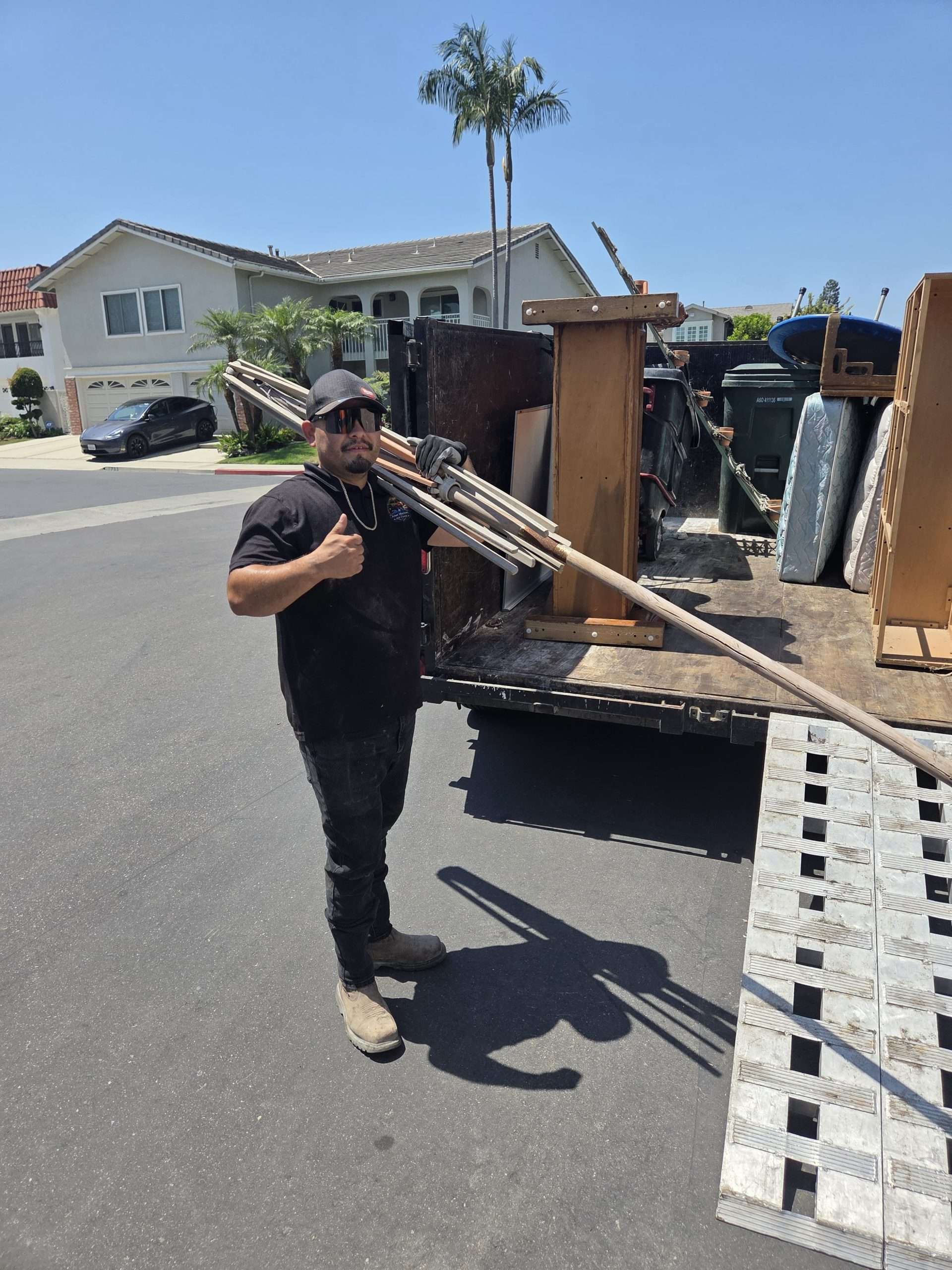 A&G Hauling crew removing household items from an Irvine home