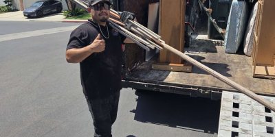 Furniture and household rubbish loaded into a trailer